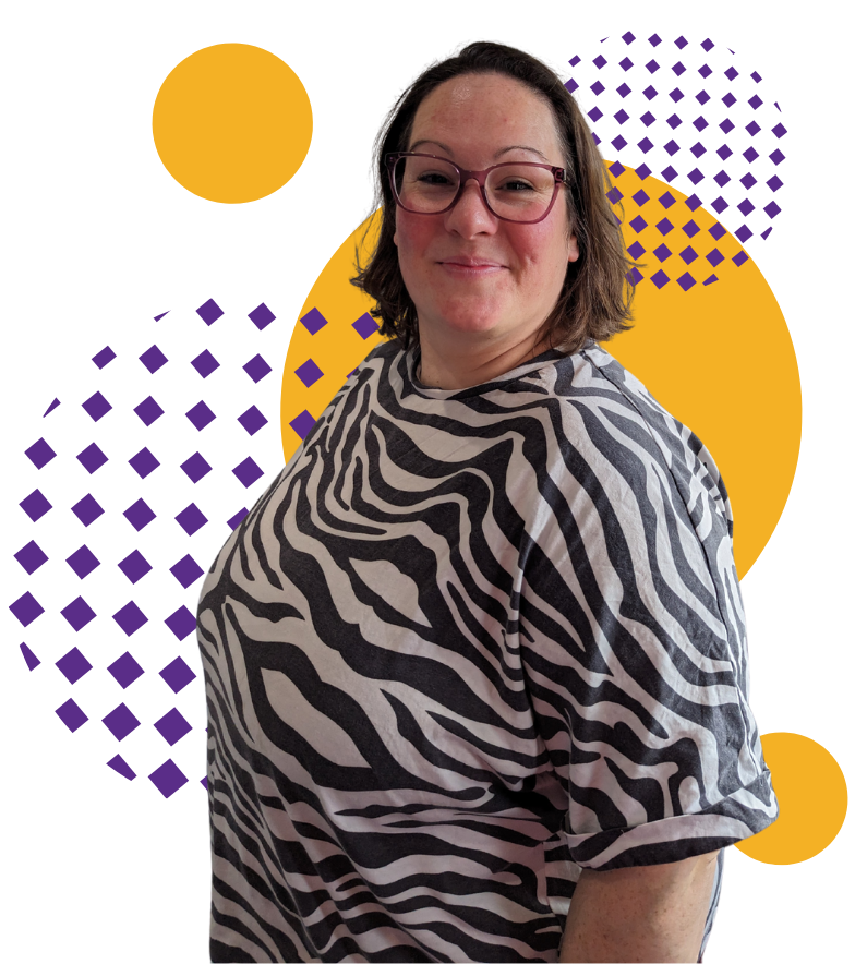 Cat Rowley is standing side ways to the camera smiling at us wearing a zebra print t-shirt and purple glasses. There are purple and yellow geometric shapes in the background.